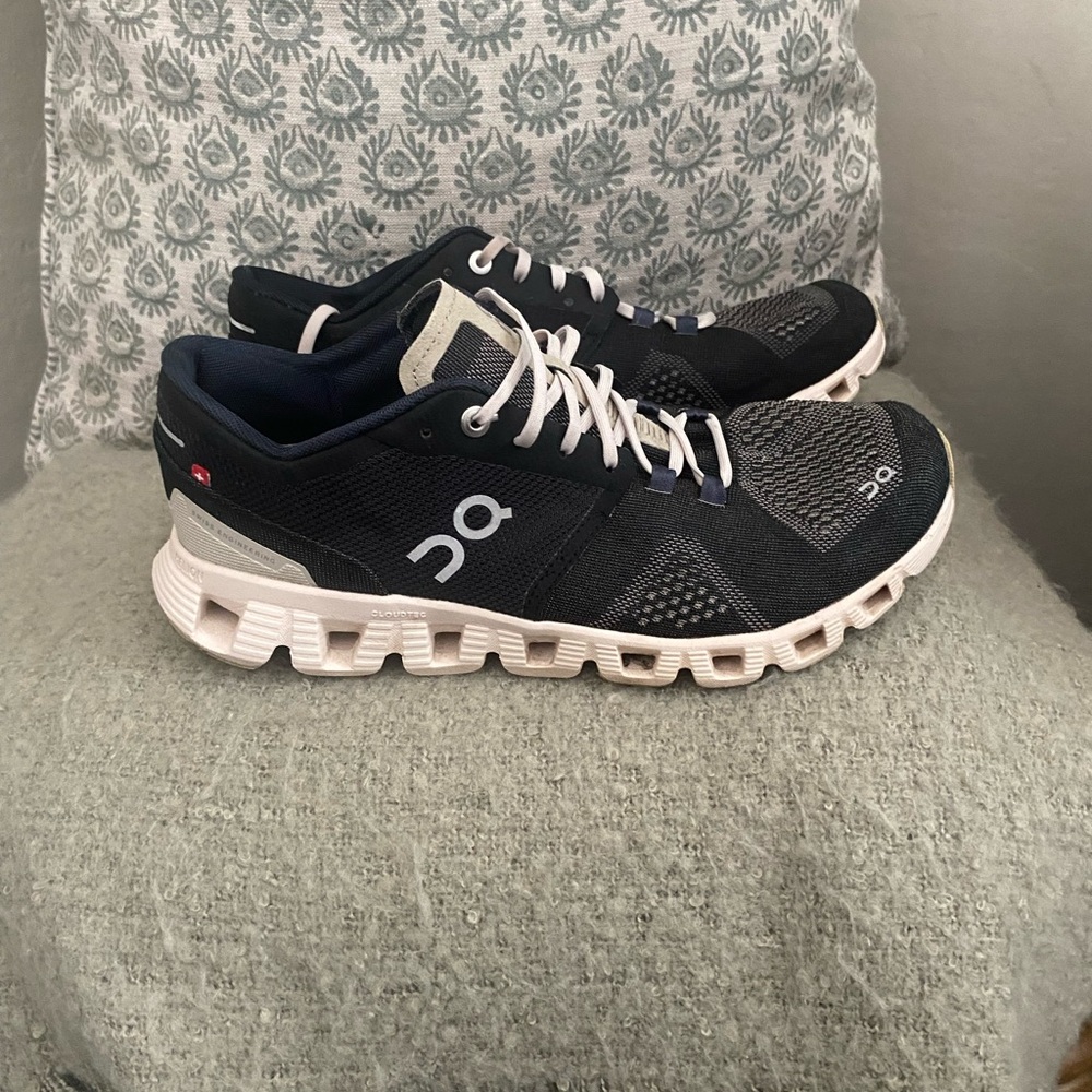 On Running Black and White Athletic Shoes